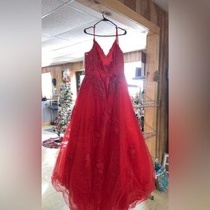 Elegant Red Gown with Floral Details